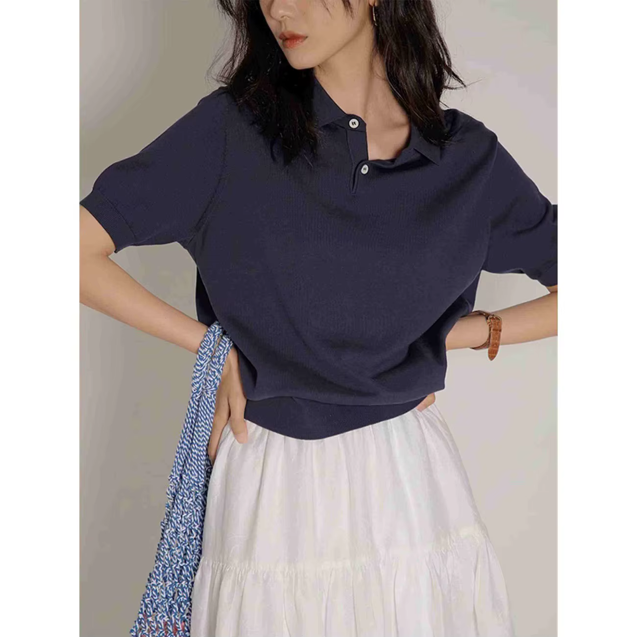 Polo tricoté à manches courtes pour femme