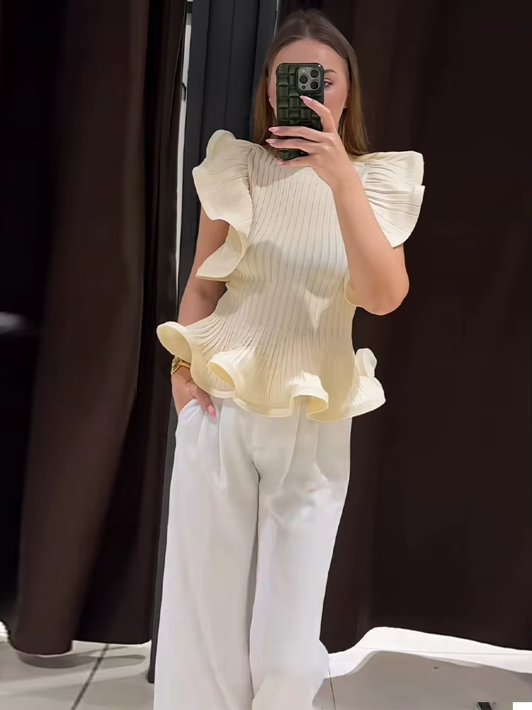 Hauts pour femmes en maille à volants sans manches