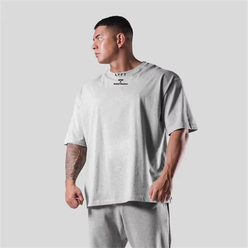 T-shirt en coton pour homme, coupe ample, manches courtes, adapté au sport, à la remise en forme, à la course à pied et aux entraînements
