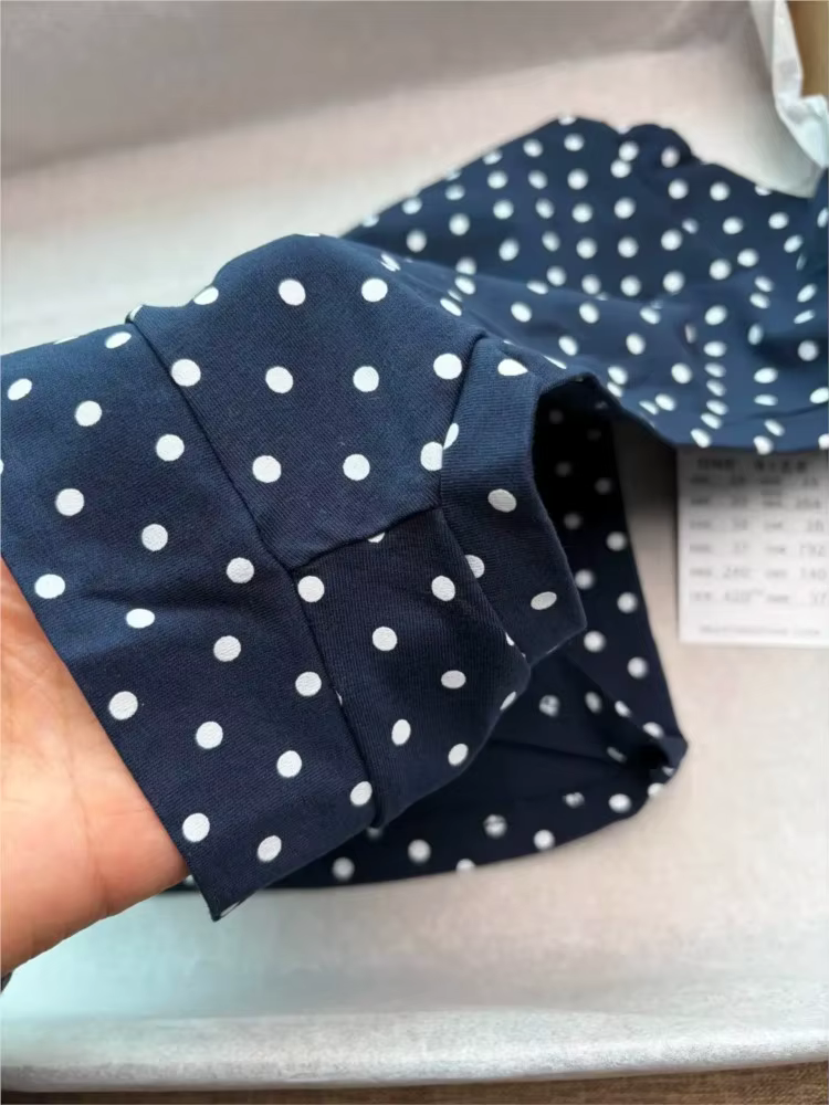 T-shirts sans manches à col en V à pois bleu marine pour femmes