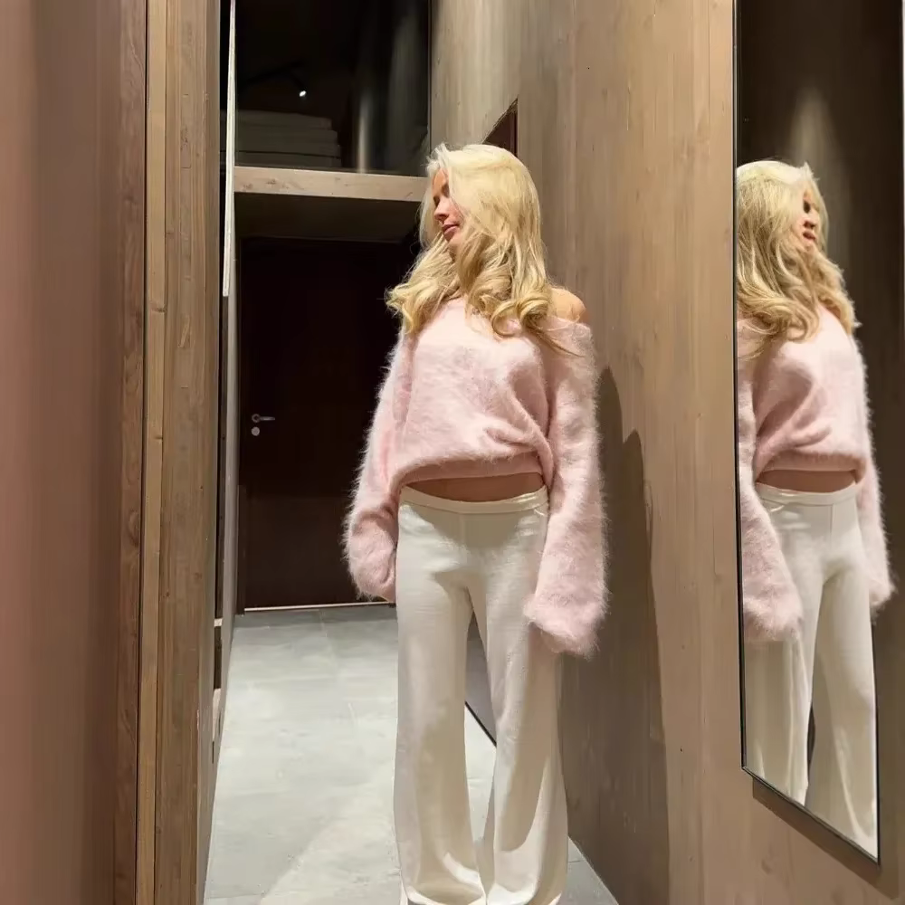 Pull dos nu pour femme