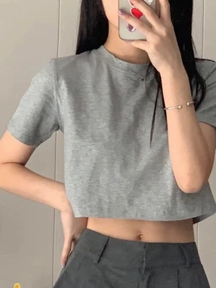 T-shirt femmes recadrée solide Sexy minimaliste offre spéciale mince décontracté mode Preppy Chic Tops basiques Style coréen Streetwear populaire