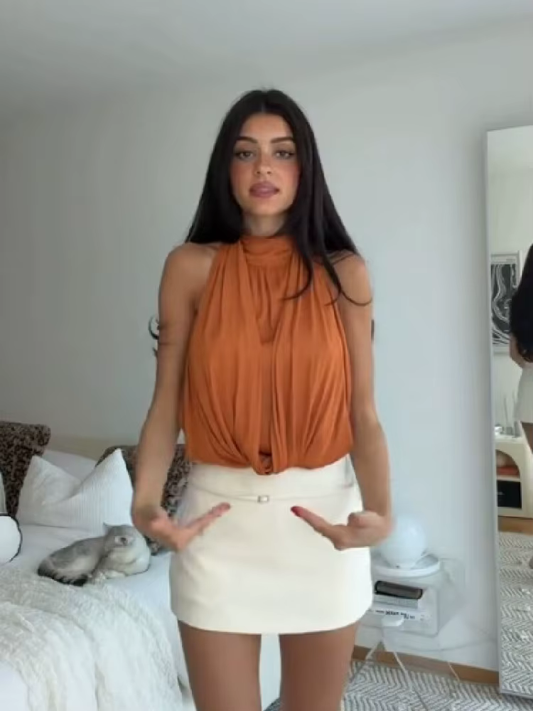 Haut orange sexy à col halter pour femme