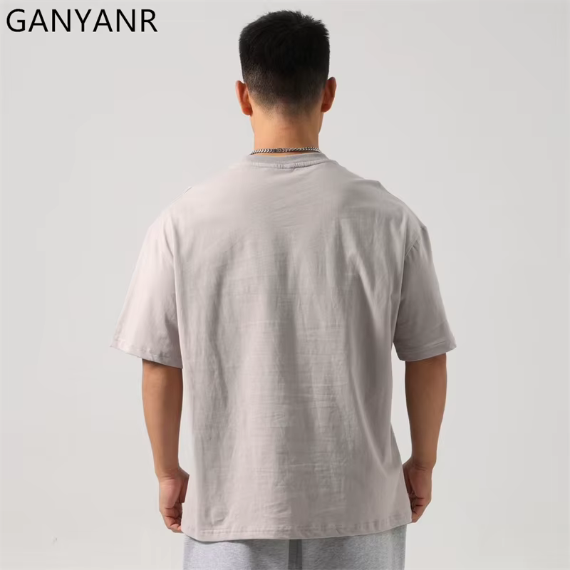 GANYANR T-shirt de course pour hommes vêtements de golf d'été Fitness actif à manches courtes musculation gymnase