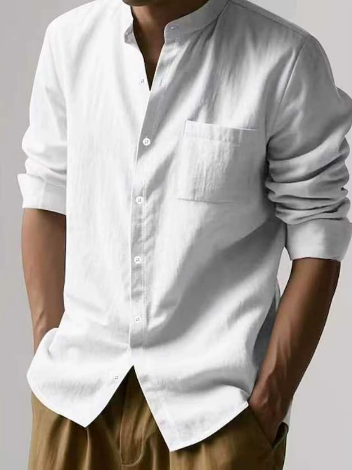 Chemise boutonnée en lin blanc minimaliste pour homme