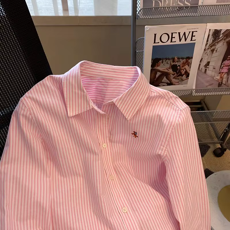 Chemise rayée à col polo pour femme
