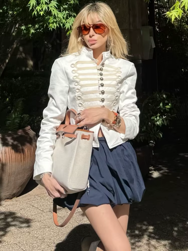 Veste élégante blanche nouée pour femme