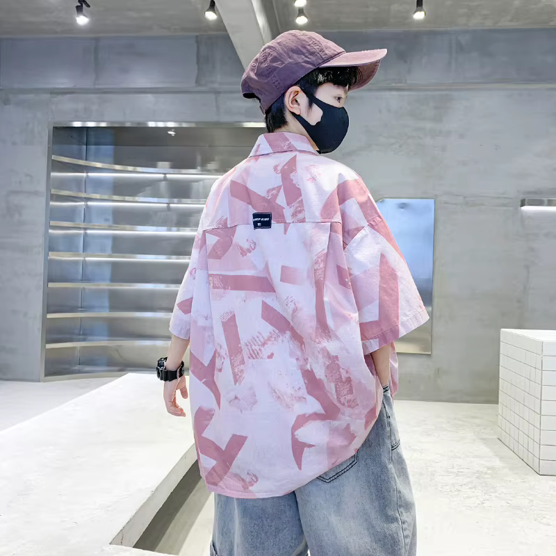 Chemise d'été élégante de couleur rose pour enfants