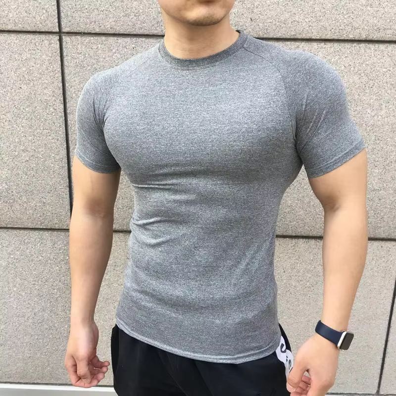 Nouveaux hommes d'été à manches courtes Fitness t-shirt course Sport Gym couleur unie séchage rapide